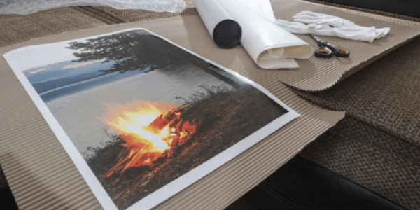 Fire on beach next to small tree with waves in background - Best Poster Printing in Brisbane - Call Infinite Print today